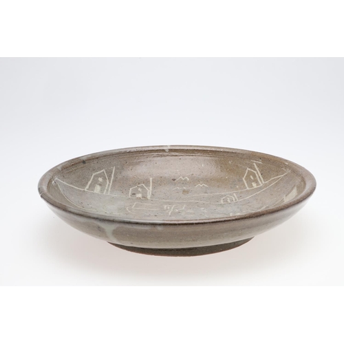 748 - TREVOR CORSER (1938-2015) - ST IVES STUDIO POTTERY BOWL. A stoneware bowl with a green ash glaze, de... 