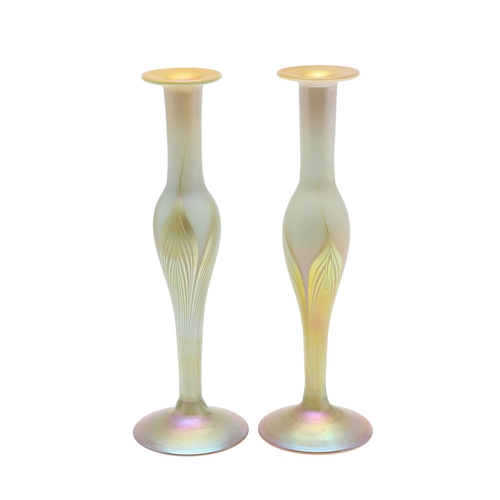 753 - LOUIS COMFORT TIFFANY - PAIR OF FAVRILE IRIDESCENT GLASS VASES. A pair of slender iridescent glass v... 