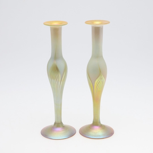 753 - LOUIS COMFORT TIFFANY - PAIR OF FAVRILE IRIDESCENT GLASS VASES. A pair of slender iridescent glass v... 