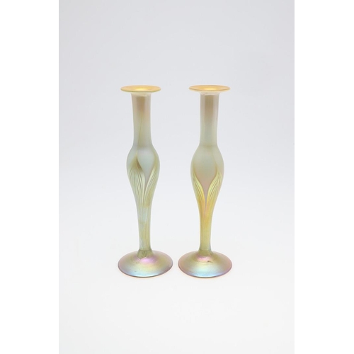 753 - LOUIS COMFORT TIFFANY - PAIR OF FAVRILE IRIDESCENT GLASS VASES. A pair of slender iridescent glass v... 