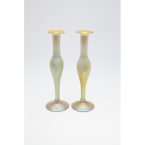 753 - LOUIS COMFORT TIFFANY - PAIR OF FAVRILE IRIDESCENT GLASS VASES. A pair of slender iridescent glass v... 