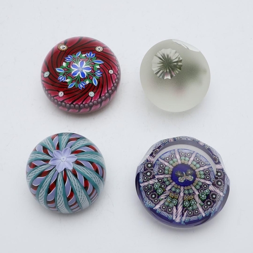 773 - PERTHSHIRE GLASS PAPERWEIGHTS. Four Perthshire paperweights including Magnum Millefiori a faceted ca... 