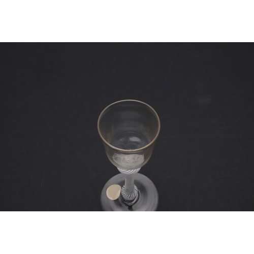 778 - 18THC WINE GLASS - OPAQUE TWIST. The wine glass with ogee shaped bowl, with shoulder and lower knop ... 