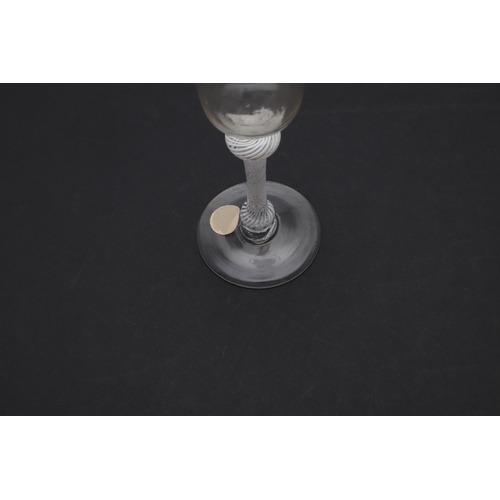 778 - 18THC WINE GLASS - OPAQUE TWIST. The wine glass with ogee shaped bowl, with shoulder and lower knop ... 