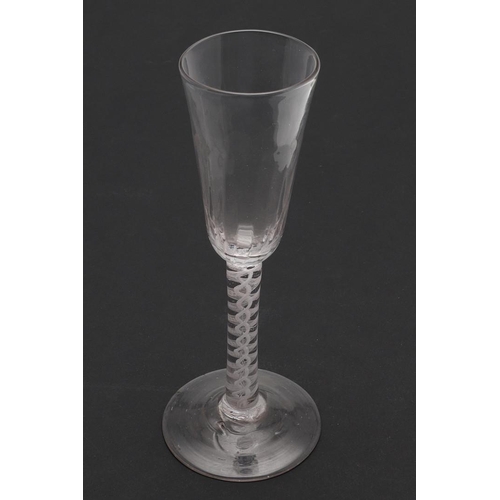 788 - PAIR OF ANTIQUE CORDIAL GLASSES. A pair of cordial glasses with an elongated shaped bowl, with air t... 