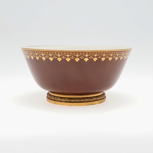 791 - A SEVRES PORCELAIN BOWL ON GILT METAL BASE - PARIS RETAILER 'RISLER & CARRE'. A porcelain bowl with ... 