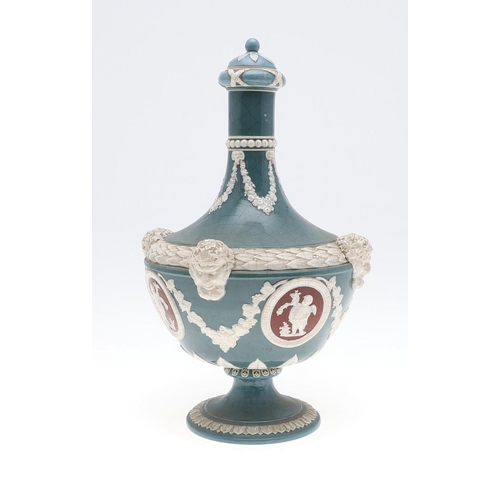 796 - WEDGWOOD TRI COLOUR JASPER WARE LIDDED VASE. A 19thc lidded vase with four small vignettes of cherub... 