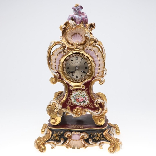 799 - LARGE FRENCH PORCELAIN CLOCK - CHARPENTIER SAINT MALO. A rococo style porcelain mantle clock, painte... 