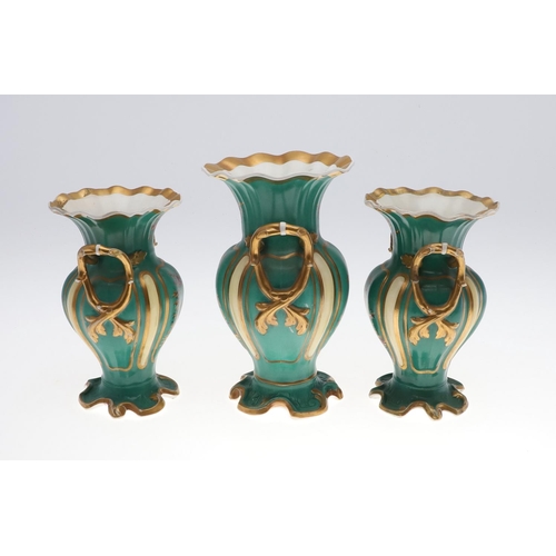 805 - H & R DANIEL - GARNITURE OF VASES. In the Chinese style, the twin handled vases  painted with a sing... 