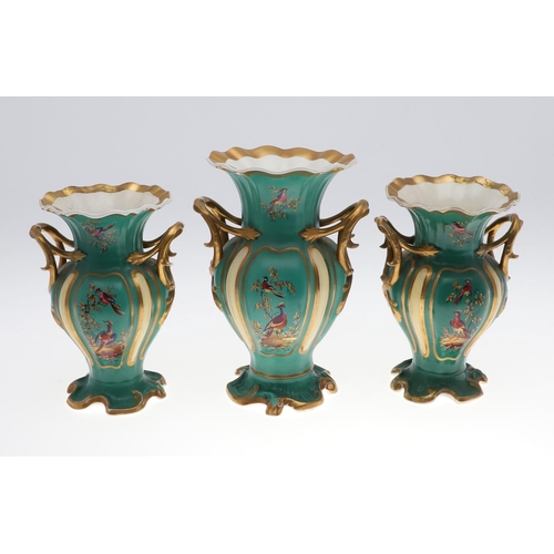 805 - H & R DANIEL - GARNITURE OF VASES. In the Chinese style, the twin handled vases  painted with a sing... 