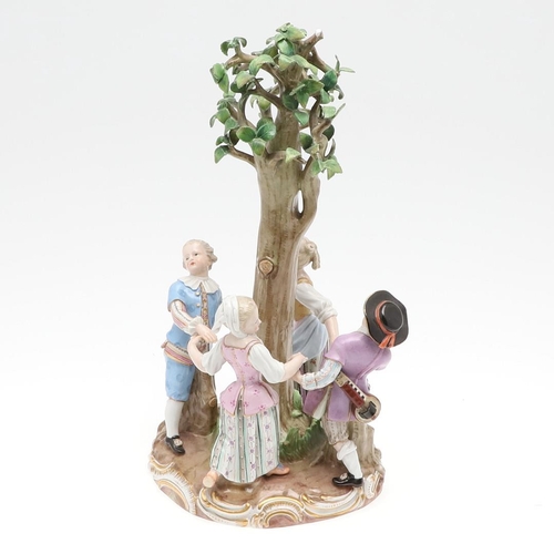 821 - MEISSEN FIGURE GROUP OF CHILDREN. 19thc, modelled as four children holding hands and dancing around ... 