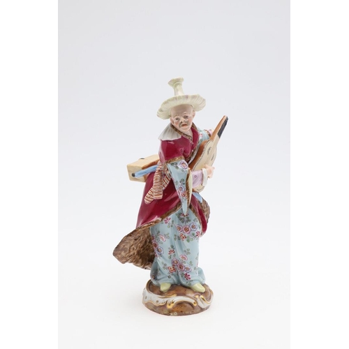 824 - MEISSEN PORCELAIN FIGURE OF A MUSICIAN & PORCELAIN TEA BOWL. A 19thc figure of a Male Malabar Musici... 