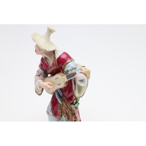 824 - MEISSEN PORCELAIN FIGURE OF A MUSICIAN & PORCELAIN TEA BOWL. A 19thc figure of a Male Malabar Musici... 