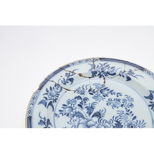 829 - ANTIQUE DELFT CHARGER & TWO OTHERS. Probably 18thc, a blue and white delft charger painted with spra... 