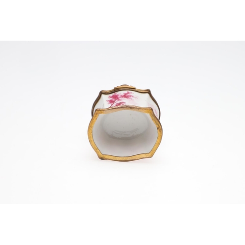 830 - CONTINENTAL PORCELAIN TABLE BOX. The small porcelain box with brass mounts to rim and base, with puc... 