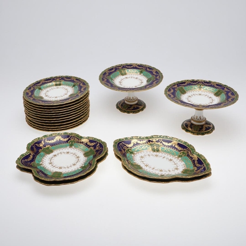 831 - CROWN DERBY DESSERT SERVICE. An unusual dessert service, with gilded decoration on a blue and green ... 