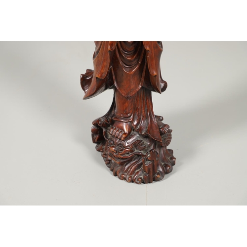 839 - LARGE CHINESE CARVED WOODEN FIGURE - GUANYIN. A late 19thc/early 20thc carved wooden figure of Guany... 