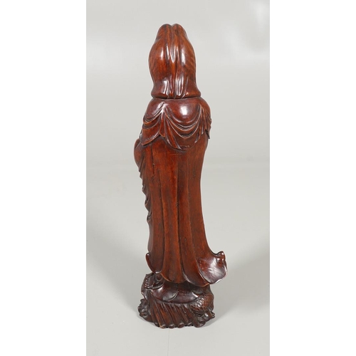 839 - LARGE CHINESE CARVED WOODEN FIGURE - GUANYIN. A late 19thc/early 20thc carved wooden figure of Guany... 