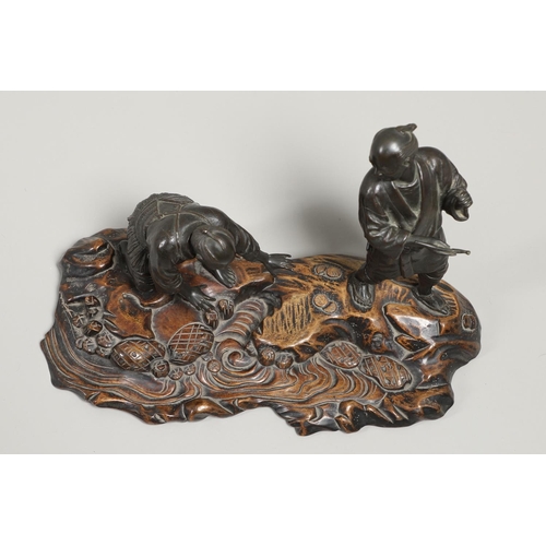 850 - JAPANESE BRONZE FIGURE GROUP & CARVED WOODEN STAND. Meiji period, including two detailed bronze figu... 