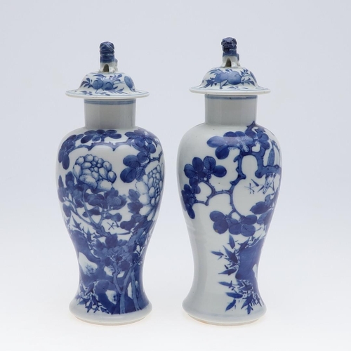 861 - PAIR OF CHINESE BLUE & WHITE VASES & COVERS. A pair of late 19thc Chinese export vases, each painted... 