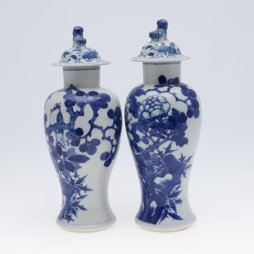 861 - PAIR OF CHINESE BLUE & WHITE VASES & COVERS. A pair of late 19thc Chinese export vases, each painted... 