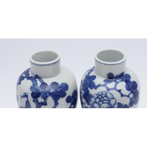 861 - PAIR OF CHINESE BLUE & WHITE VASES & COVERS. A pair of late 19thc Chinese export vases, each painted... 