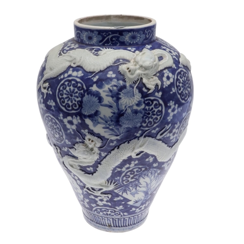 862 - LARGE JAPANESE ARITA BLUE & WHITE PORCELAIN JAR. A large 19thc Arita jar of tapering form, painted w... 