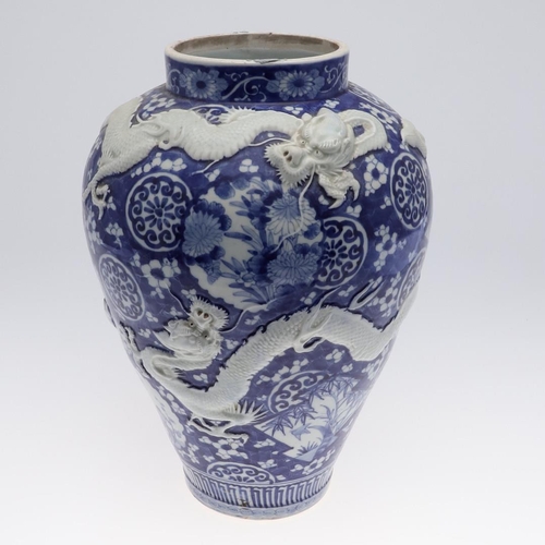 862 - LARGE JAPANESE ARITA BLUE & WHITE PORCELAIN JAR. A large 19thc Arita jar of tapering form, painted w... 