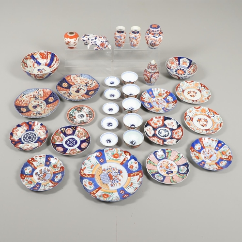 864 - COLLECTION OF JAPANESE IMARI DISHES & PLATES. A large mixed lot including two similar dishes painted... 