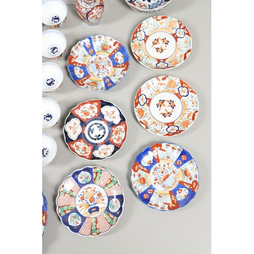 864 - COLLECTION OF JAPANESE IMARI DISHES & PLATES. A large mixed lot including two similar dishes painted... 