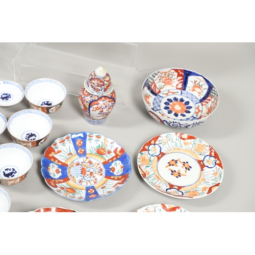 864 - COLLECTION OF JAPANESE IMARI DISHES & PLATES. A large mixed lot including two similar dishes painted... 