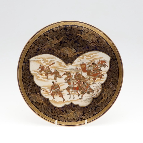 865 - JAPANESE SATSUMA PLATE - SIGNED. Meiji period, an unusual decorative Japanese Satsuma plate decorate... 