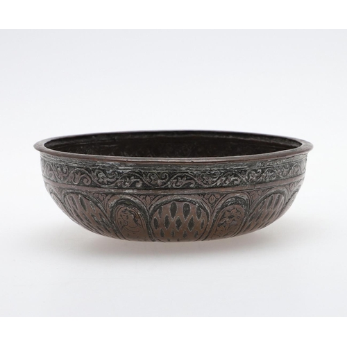 873A - ANTIQUE MIDDLE EASTERN COPPER BOWL - SIGNED. A small shallow bowl, with a repeating pattern includin... 