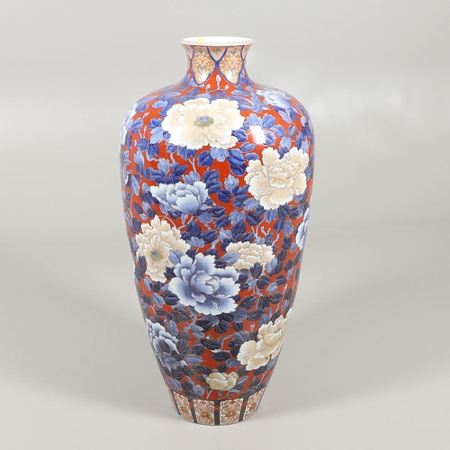 877 - UNUSUALLY LARGE JAPANESE IMARI VASE. 20thc, an unusually large vase of tapering form, painted with f... 