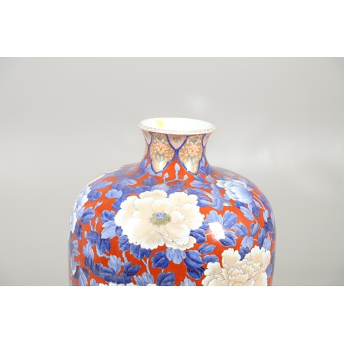 877 - UNUSUALLY LARGE JAPANESE IMARI VASE. 20thc, an unusually large vase of tapering form, painted with f... 