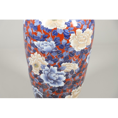 877 - UNUSUALLY LARGE JAPANESE IMARI VASE. 20thc, an unusually large vase of tapering form, painted with f... 