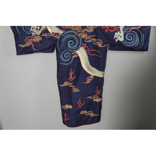 880 - ANTIQUE CHINESE SILK EMBROIDERED ROBE. Probably late 19thc/early 20thc, a full length blue silk robe... 