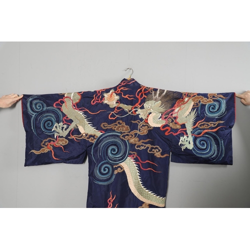 880 - ANTIQUE CHINESE SILK EMBROIDERED ROBE. Probably late 19thc/early 20thc, a full length blue silk robe... 