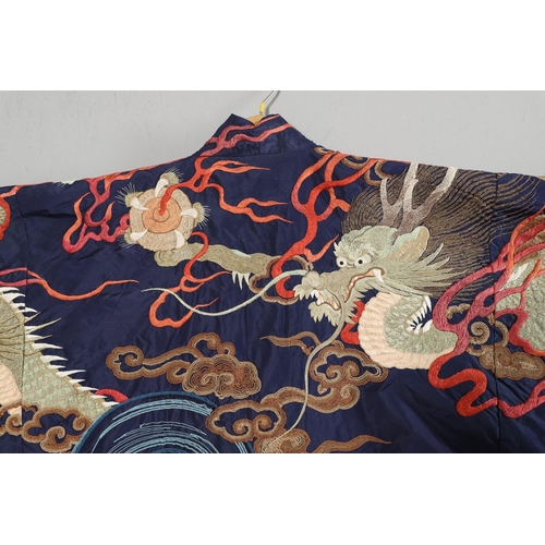 880 - ANTIQUE CHINESE SILK EMBROIDERED ROBE. Probably late 19thc/early 20thc, a full length blue silk robe... 