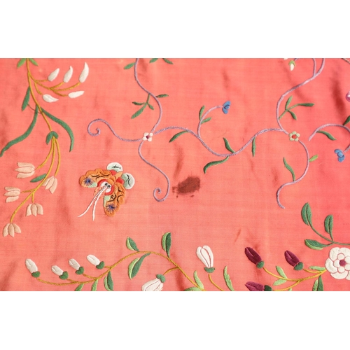 882 - TWO CHINESE SILK EMBROIDERED SHAWLS. Two large Chinese shawls, including a large pink silk shawl, he... 