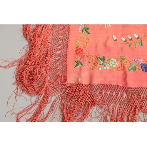 882 - TWO CHINESE SILK EMBROIDERED SHAWLS. Two large Chinese shawls, including a large pink silk shawl, he... 