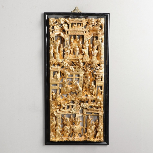 883 - LARGE CHINESE CARVED & GILDED WOODEN PANEL. A large rectangular wooden pierced panel, heavily carved... 