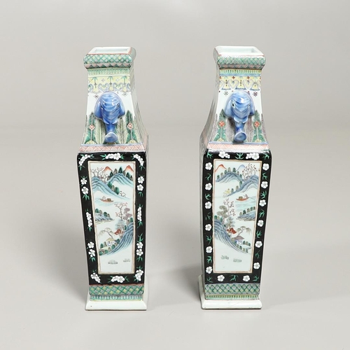 886 - PAIR OF CHINESE FAMILLE NOIR PORCELAIN VASES - ELEPHANT MASK HANDLES. Late 19thc of square tapering ... 