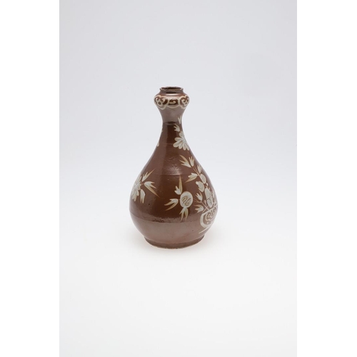 888 - CHINESE BOTTLE SHAPED VASE WITH WHITE SLIP - 16TH/17TH CENTURY. Late Ming circa 16th/17thc, the porc... 