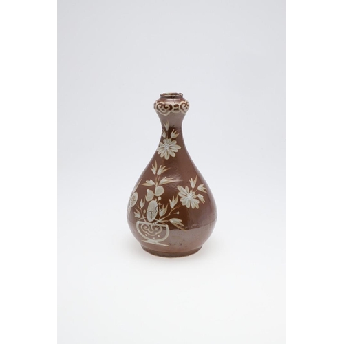 888 - CHINESE BOTTLE SHAPED VASE WITH WHITE SLIP - 16TH/17TH CENTURY. Late Ming circa 16th/17thc, the porc... 