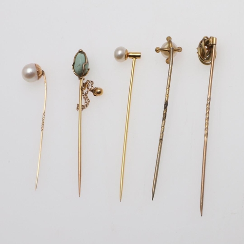 1021 - AN OPAL AND GOLD STICK PIN. mounted with an oval-shaped solid white opal, in gold, together with a t... 