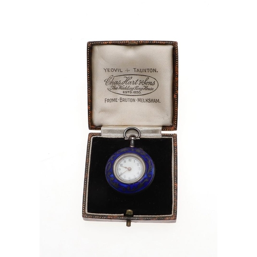 1022 - AN ENAMEL AND SILVER FOB WATCH. the white enamel dial with Arabic numerals, within a blue enamel bez... 