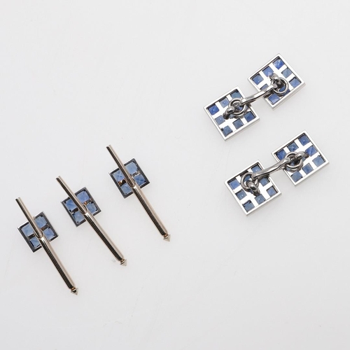 1043 - A PAIR OF SAPPHIRE CUFFLINKS BY SHREVE, CRUMP & LOW COMPANY, BOSTON. each link formed with nine squa... 