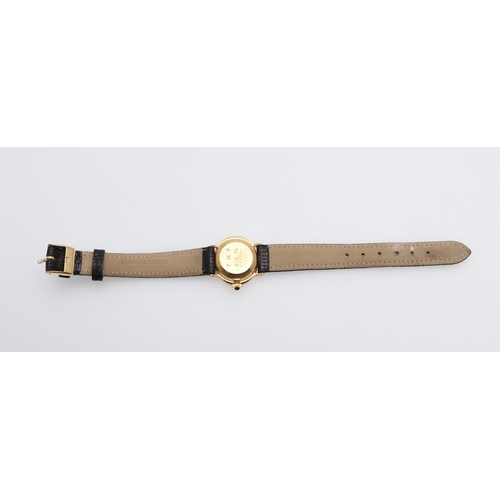 1046 - A LADY'S GOLD WRISTWATCH BY ASPREY. the signed oval-shaped dial with baton numerals and date apertur... 