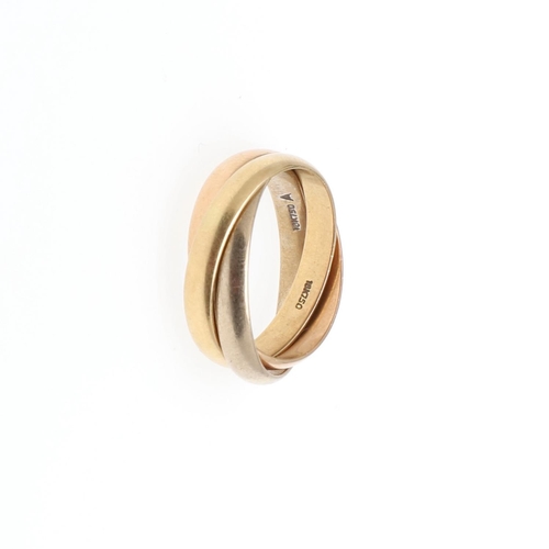 1051 - AN 18CT THREE COLOUR GOLD TRIPLE BAND RING. formed as three interlocking bands, 5.7 grams. Size G.  ... 